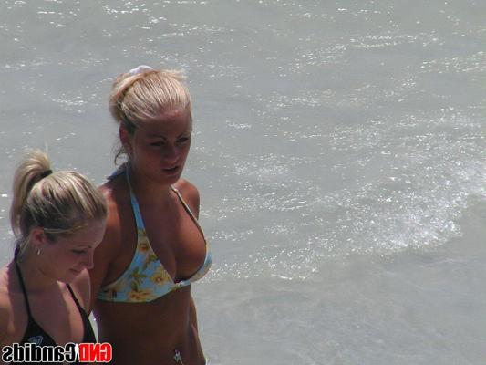 12P Pictures of hot bikini teens on a beach
