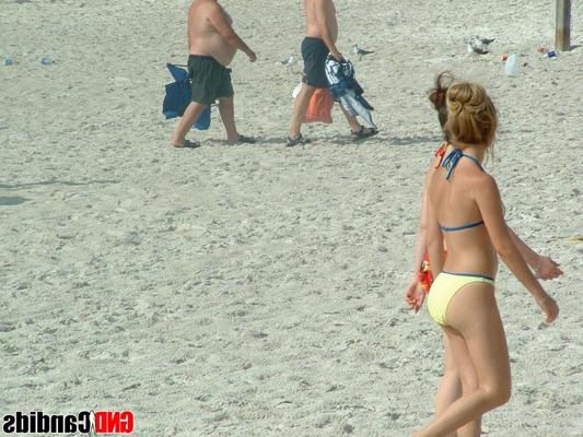 12P Pictures of bikini teens on a beach