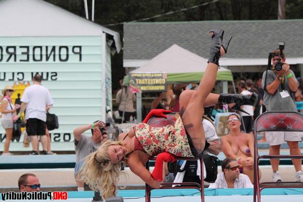 12P Hot strippers showing off for the people at an outdoor public nudity party