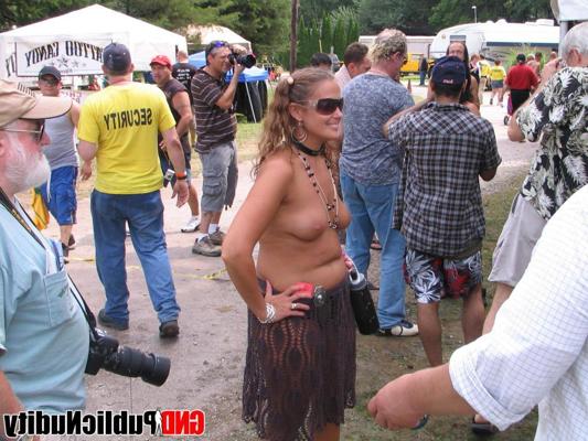 12P Multiple strippers on stage showing off at an outdoor public nudity party
