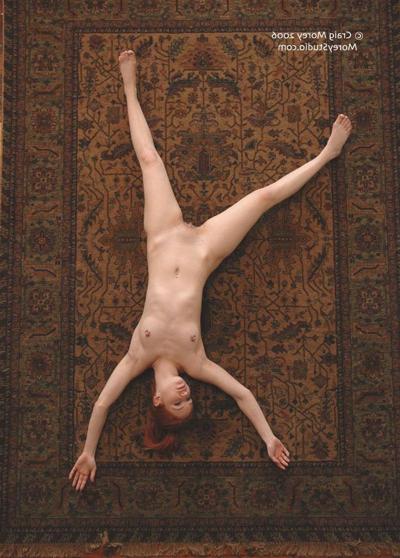 12P Redhead babe Calico shows off her nude body in a variety of poses