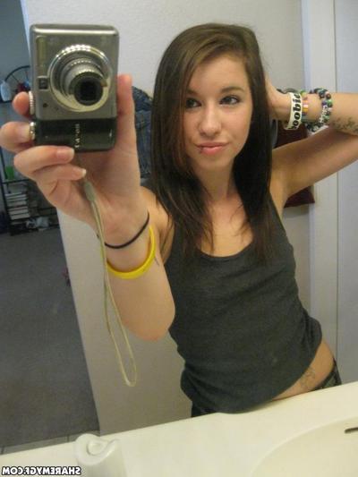 12P Hot teen shows off her perky tits and big round ass as she takes selfies