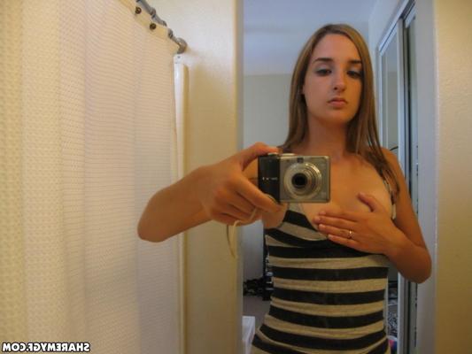 12P Cute girlfriend shows off her perky tits and round ass as she takes selfshot mirror pictures