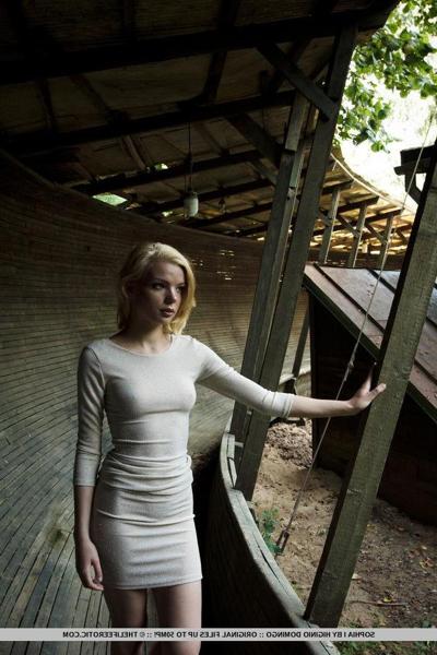 16P Blonde model Sophia I lifts her dress to show you her wet pussy outside