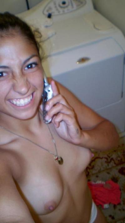 14P Gorgeous brunette babe teases on camera