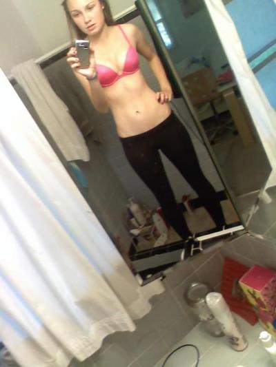14P Horny amateur babe with round tits teasing and posing