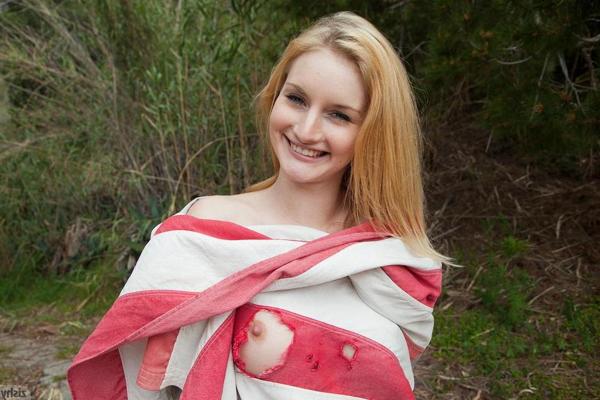 12P Hot blonde teen Ashlee Hills displays her naked body outside