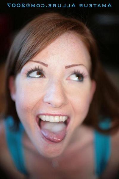 16P Pictures of sexy redhead teen going down on a hard cock