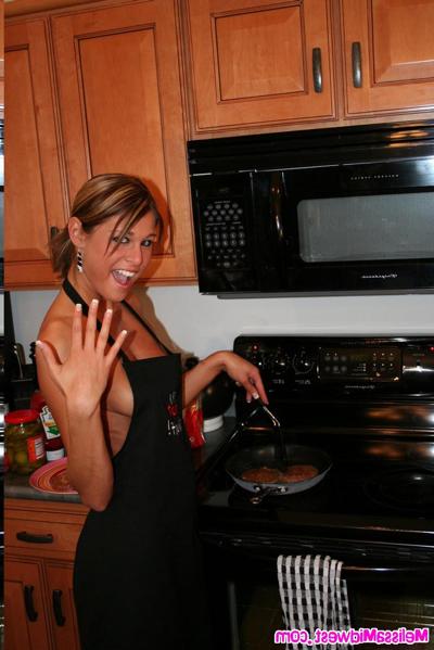 15P Melissa Midwest in the kitchen making hamburgers and hot dogs