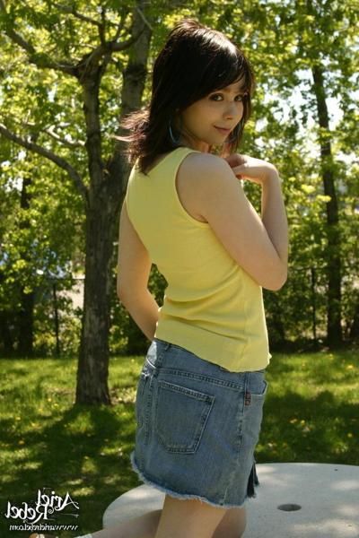 16P Teen wearing short jean skit in park