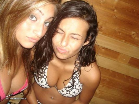 9P Photos of two amateur sexy teen lesbo lovers posing