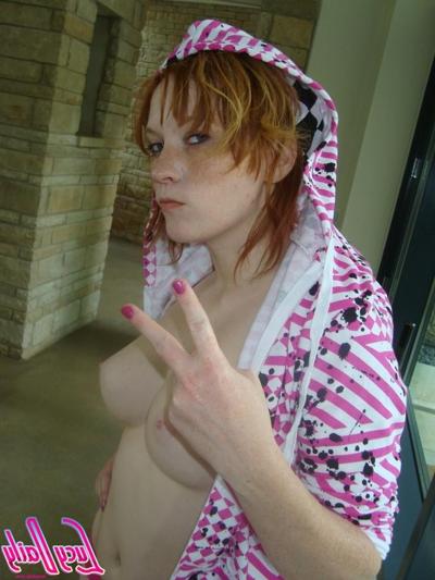16P Big boob amateur redhead puts tits on window