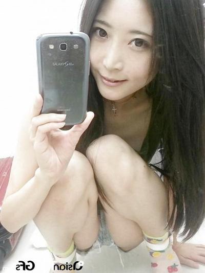 10P Super skinny teen having fun with her phone
