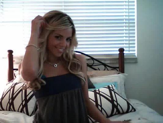 8P Amazing hot debbie gets on webcam and shows off her big tits in this hot strip s