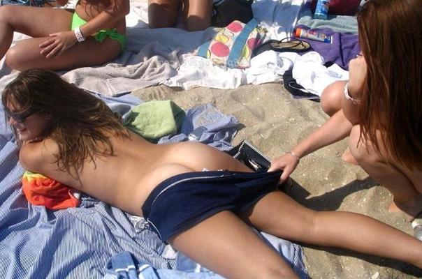 15P Nice boobs in these voyeur pictures taken on the beach