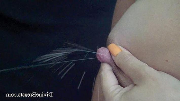 15P Closeups of a lactating babe squirting milk from tits