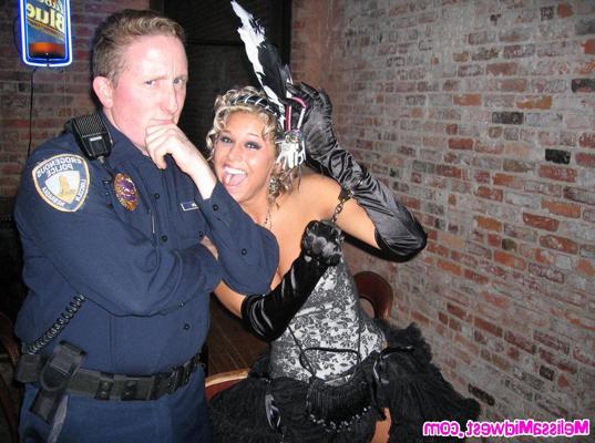 15P Melissa Midwest posing with a fake cop
