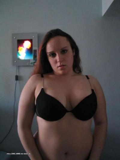 8P Gallery of a naughty chubby chick flashing her huge breasts
