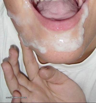 10P Photos of a naughty amateur chick loving the taste of cum