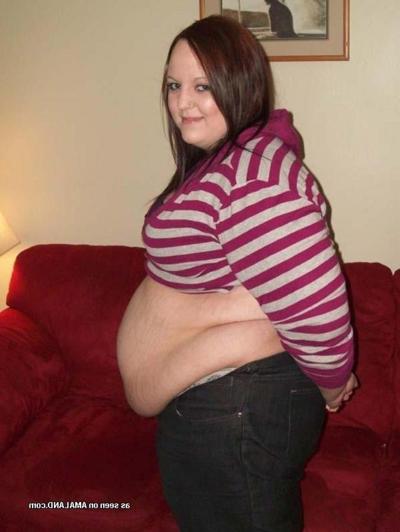 10P Gallery of a BBW with a big belly posing for the camera