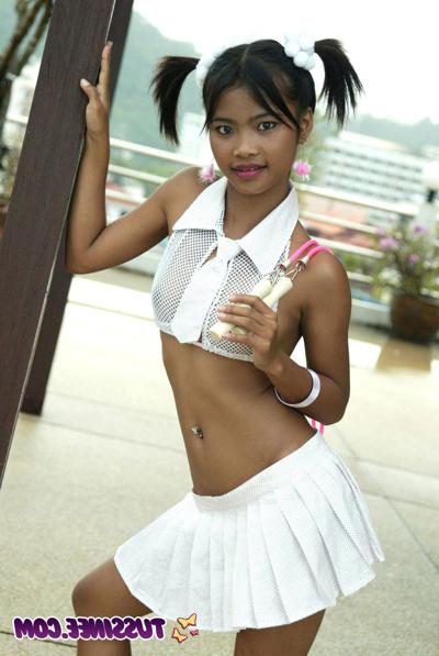 15P Really young looking Thai teen skips rope in pigtails