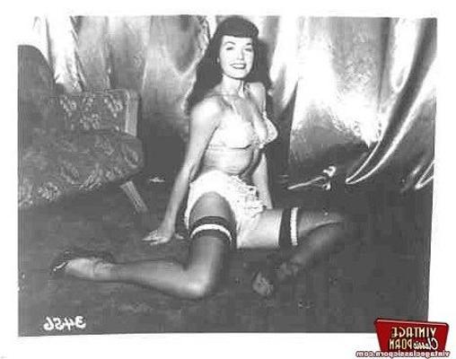 12P Betty Page loves to dance in stockings in a sensual way