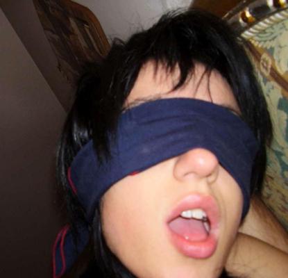 16P Pictures of a blindfolded bitch sucking on a boner