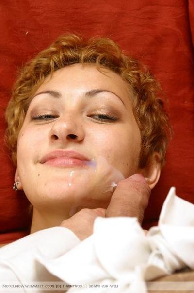 15P Nubile redhead gets a messy facial