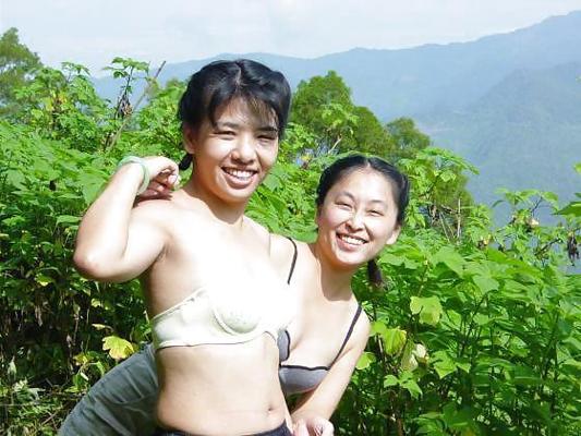 6P Asian girls at waterfall.
