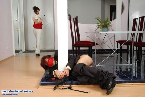 17P A glamorous strapon lady in white fucks a cuffed gentleman