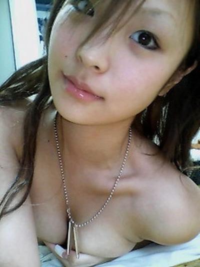 16P Asian coed goes full nude in couch shows squeezable tits