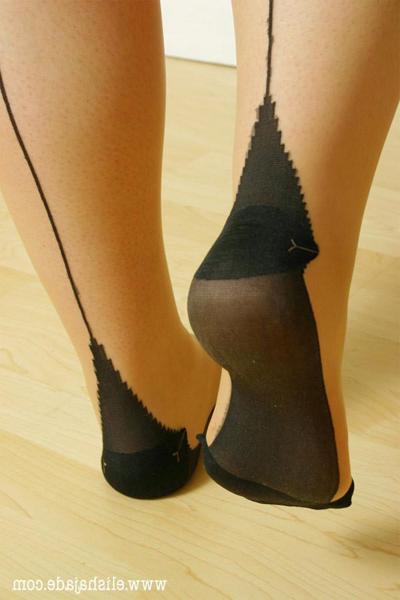 15P Seductive blonde plumper in seamed stockings and corset teasing