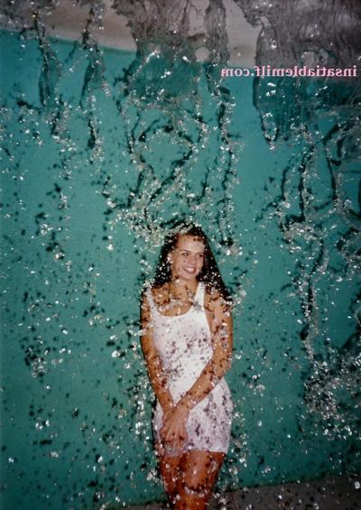 15P Sexy Diane Andrews posing in a fountain getting wet