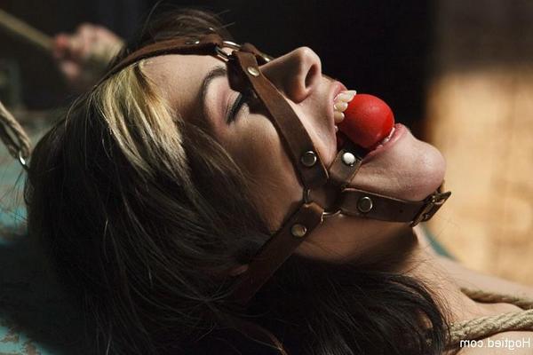 19P Katt Anomia is rope hogtied and toyed by masked man in a dark dungeon