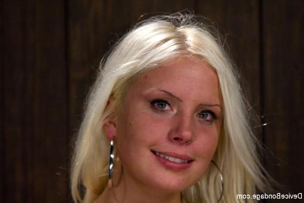 15P Kait Snow bound standing against the wall her big tits clamped