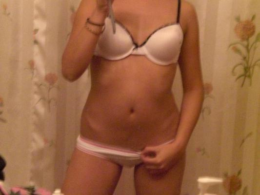 14P Gorgeous cute teen with big tits posing on camera