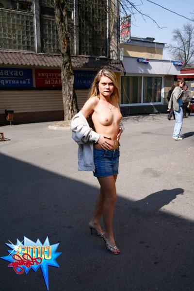 16P Busty blonde teen in mini flashes her twat in a public place