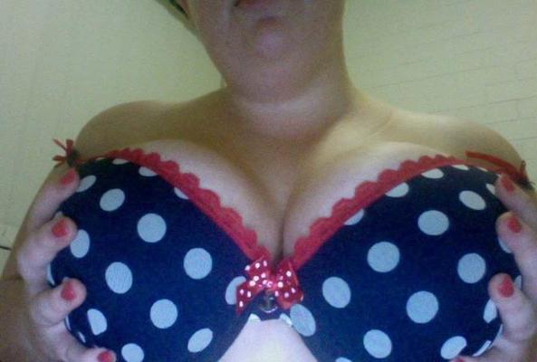 10P Photos of a fat chick showing her giant juggs