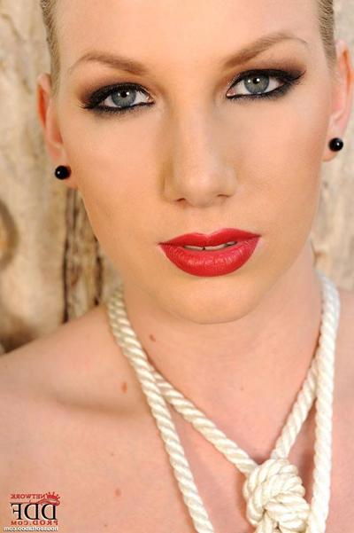 16P Danielle Maye blonde all nude girl is rope hogtied outdoors