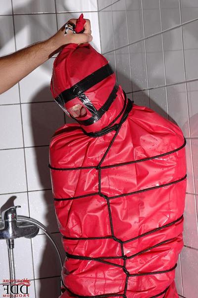 16P Miho Lechter bound in plastic in the bathroom coverd with water