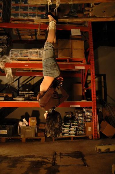 16P This slave is taken to a warehouse owned by her Master and suspended from a fork