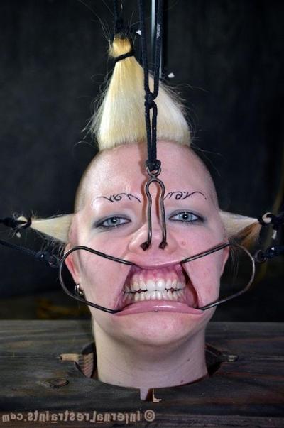 16P Denali Winter in cage is bound and spanked her tits exposed