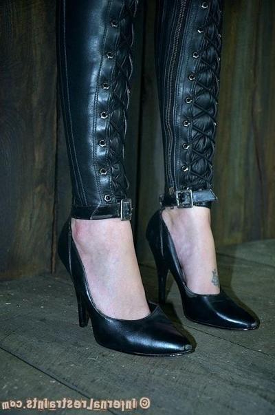 15P Hailey Young in leather bondage crying out on high heels