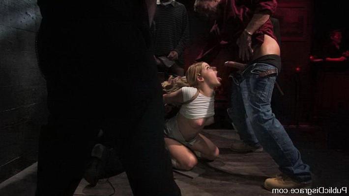 15P Charming babe in bondage act and fucked in wild orgy