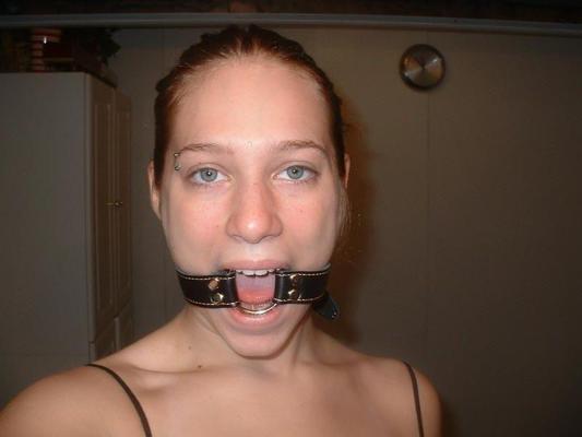 12P Hot busty babe is into bondage