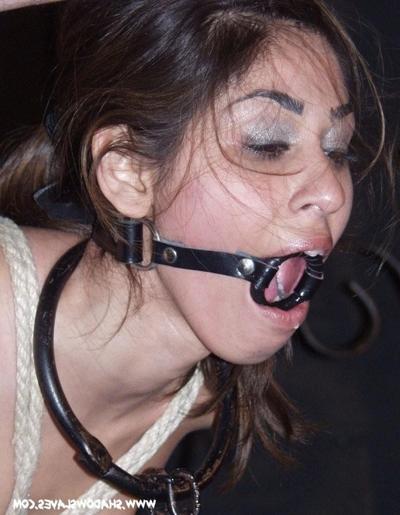 16P Indian slavegirl Sahara in bondage stocks and chained spanking on her bare botto