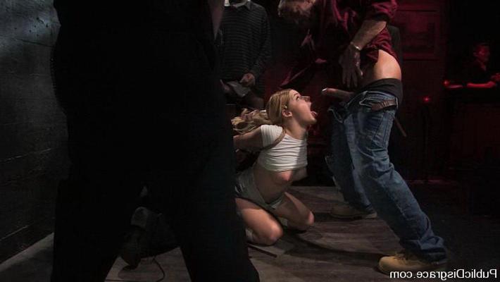 15P Nasty girl in bondage sucking pricks and fucked in wild orgy