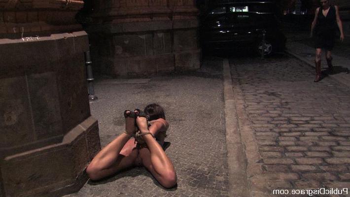 15P Slave beauty throat fucked in a subway station at night