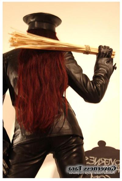 15P A strict gestapo mistress in leather and ultra high heels