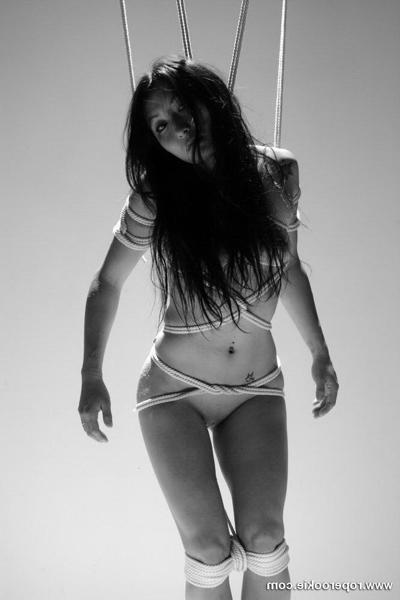 15P 15 hot pics of a girl tied bound and gagged.